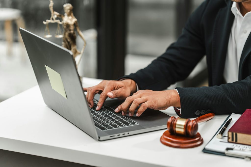 Handsome businessman lawyer of Indian descent. trusted litigation lawyers attorneys.